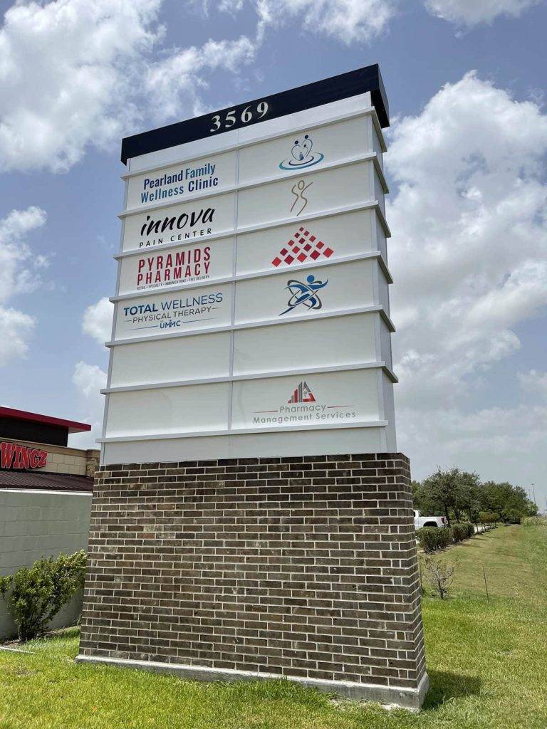 Image of a pylon sign created by Uni-Signs, displaying various medical clinics for easy navigation and identification, Katy Texas