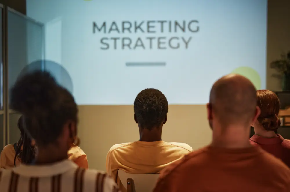 image shows a Business Training Audience
