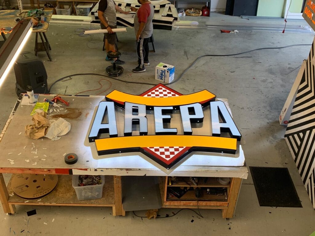 Channel letter sign being built at the Uni Signs Katy fabrication shop