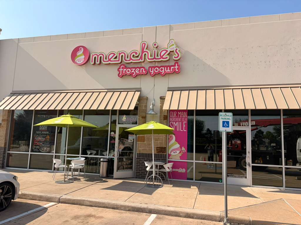 Retail storefront channel letter sign for Menchies Frozen Yogurt installed by Uni Signs in Houston Texas