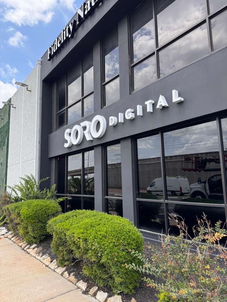 Custom channel letter storefront sign installed on commercial building by Uni Signs in Katy Texas