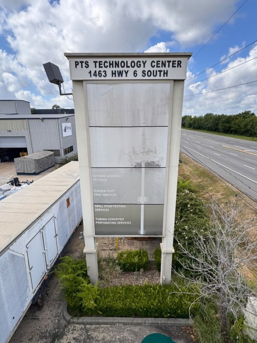 faded pylon sign face before refacing - PTS Technology Center, Highway 6 South Houston